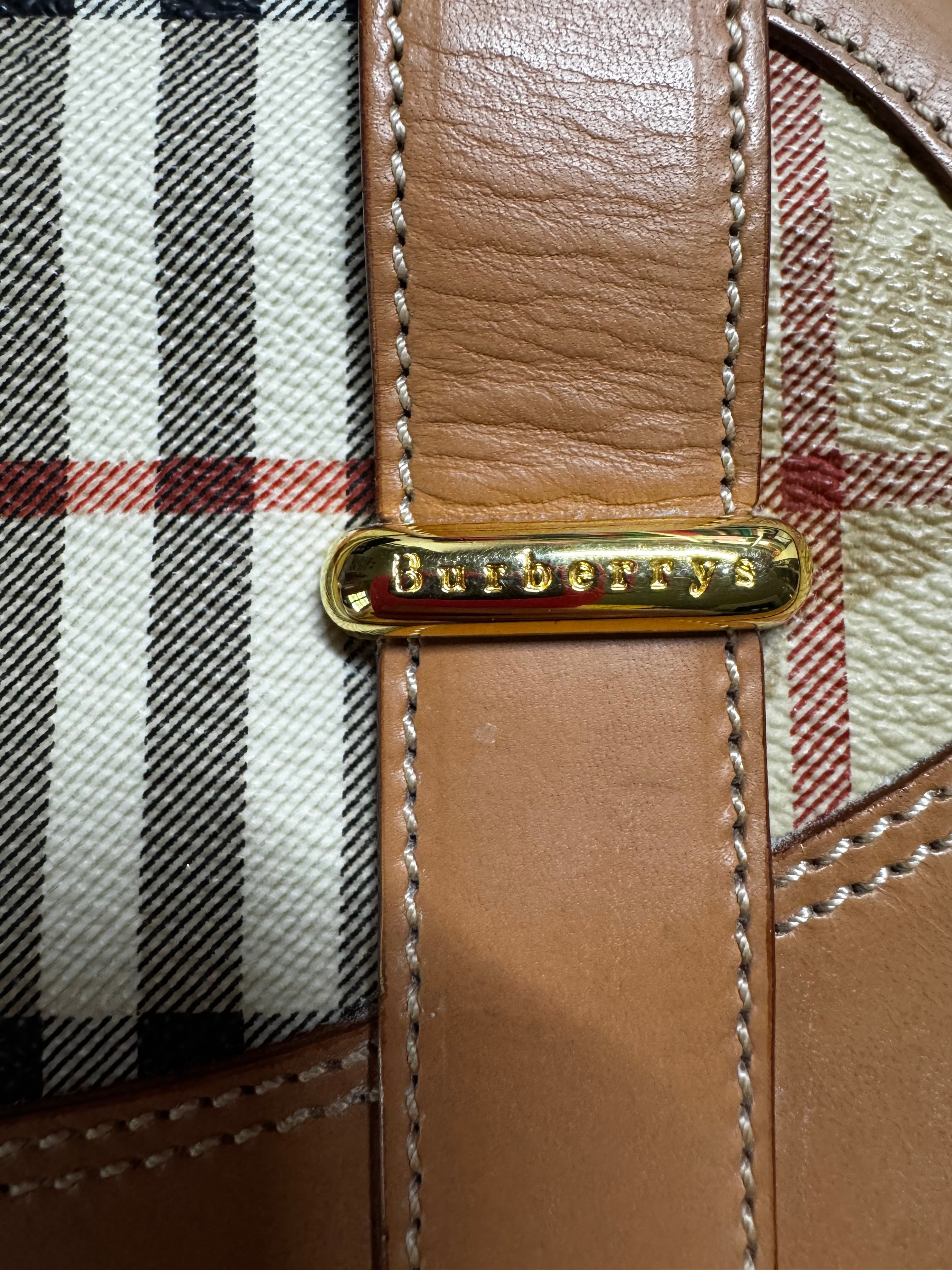 Burberry leather train case top handle bag