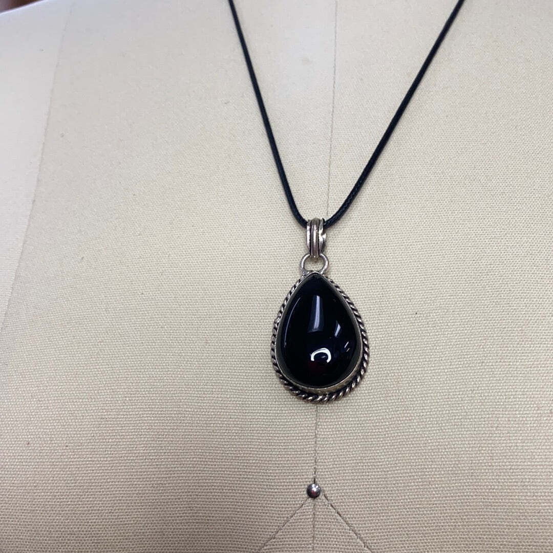 Sterling  and Obsidian pendant necklace with leather cord.