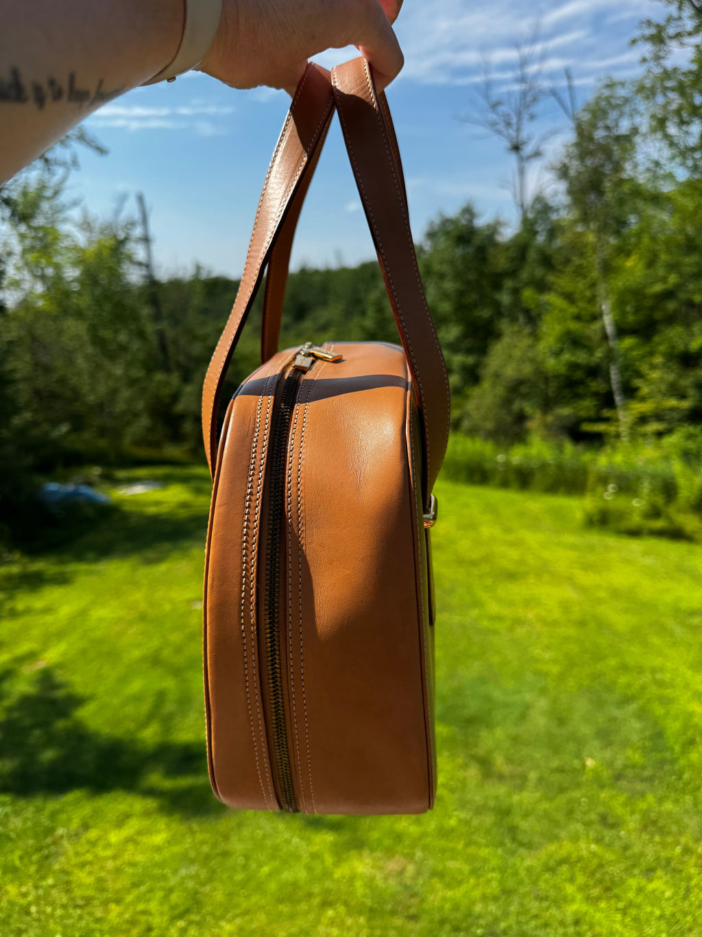 Burberry leather train case top handle bag