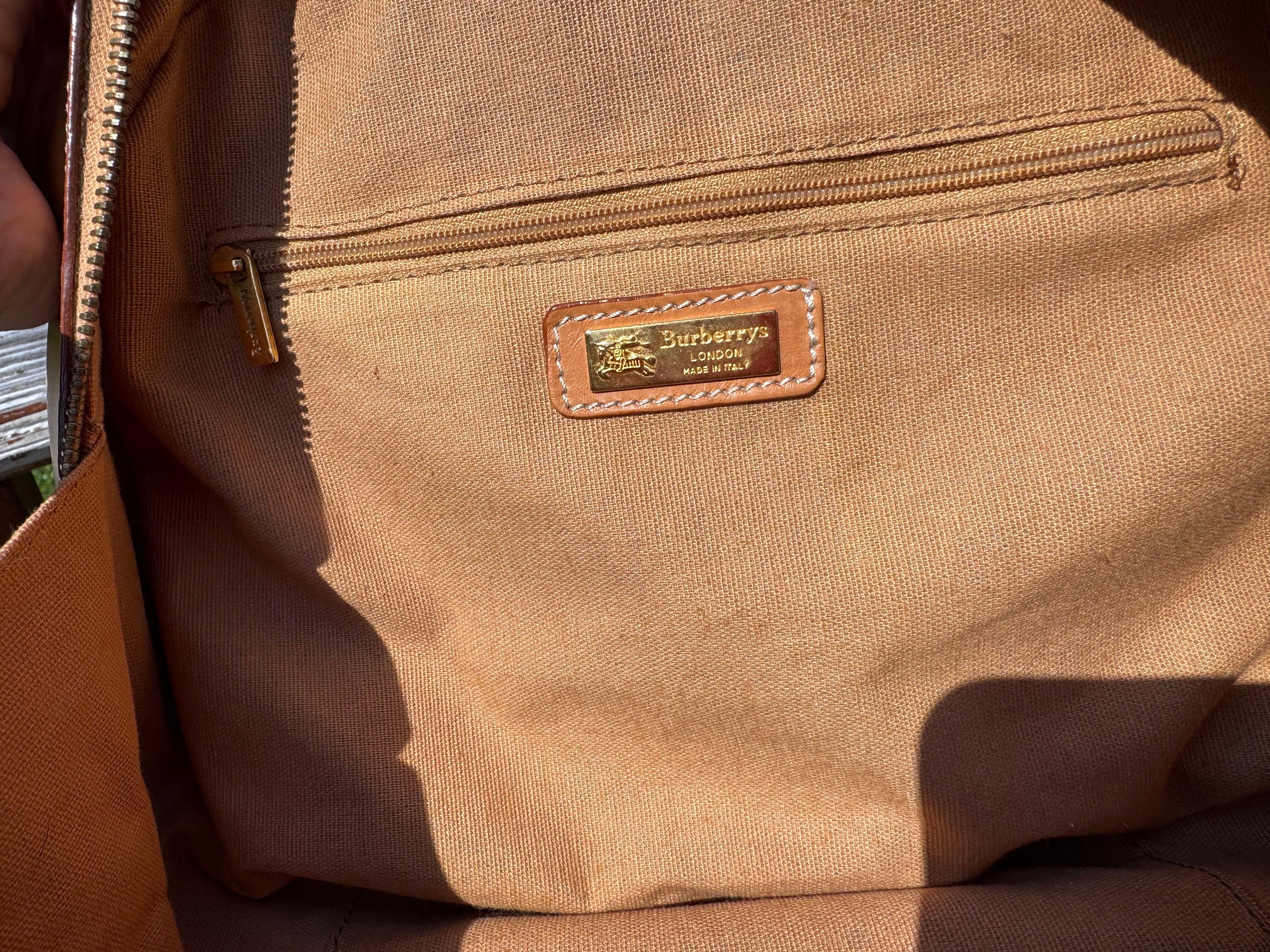 Burberry leather train case top handle bag