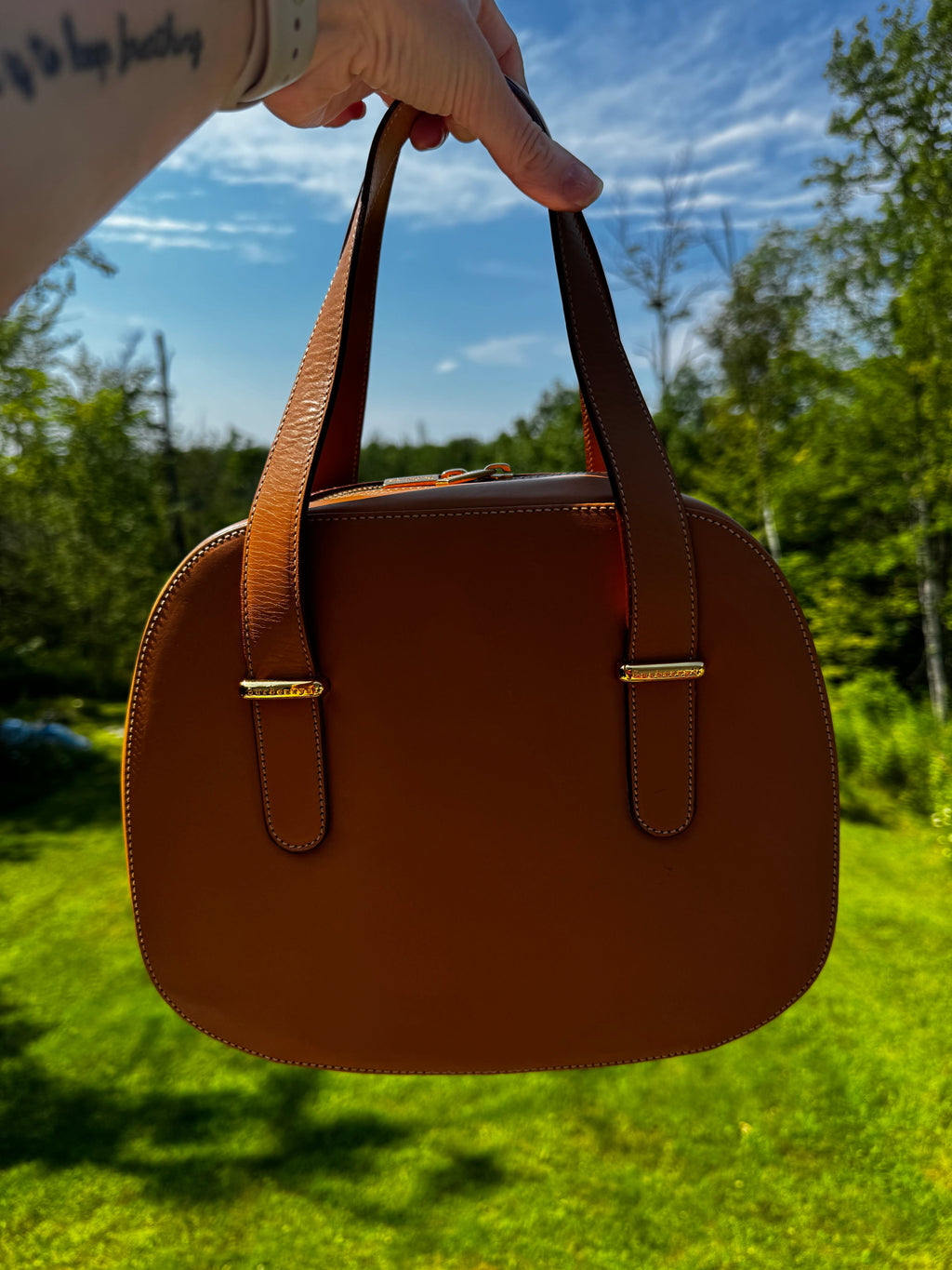 Burberry leather train case top handle bag